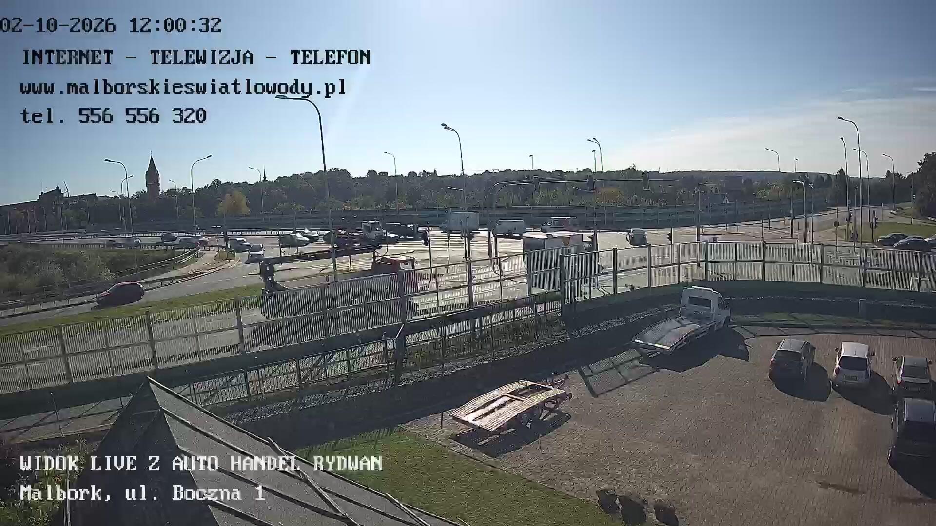 Podgląd: Widok live z Auto Handel Rydwan. Wjazd na mosty. Malbork, ul. Wałowa-Boczna. Skrzyżowanie dróg krajowych nr 22 i 55